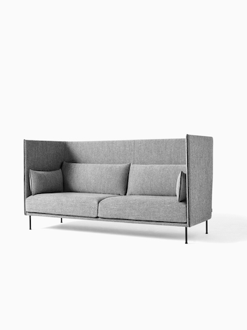 A gray high-back Silhouette Sofa. Select to go to the Silhouette Sofa product page. 