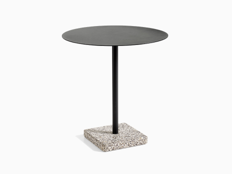 A round Terrazzo Table in black with a grey Terrazzo base.