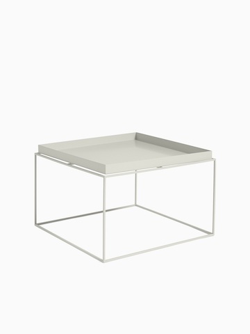 A warm gray Tray Coffee Table with hover image in black. Select to go to the Tray Coffee Table product page.