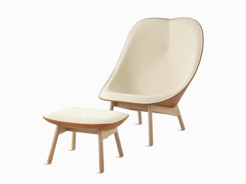 A cream Uchiwa Lounge Chair and Uchiwa Ottoman.