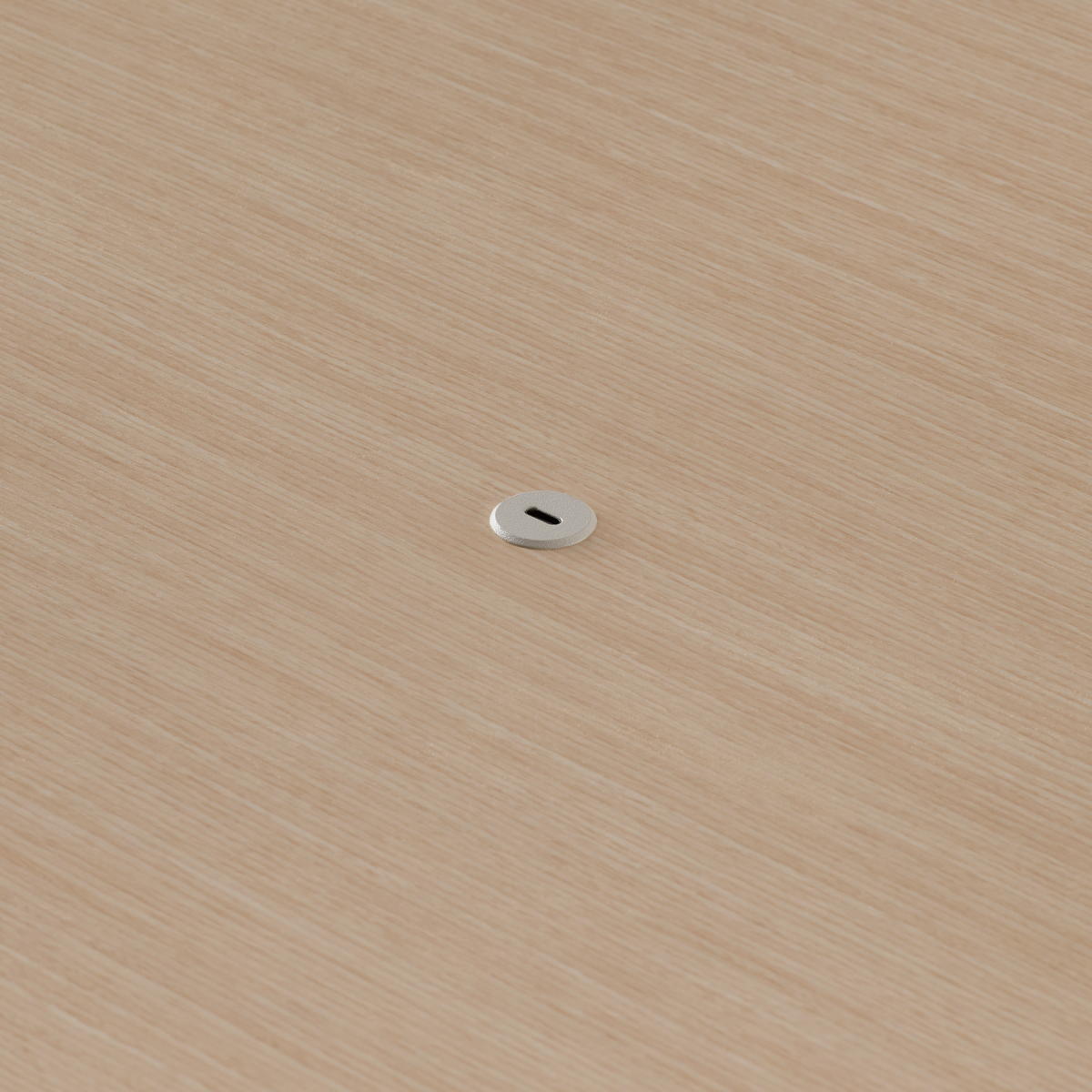 Close view of the Ello Micro Direct USB-C single port embeded in a Headway table surface.