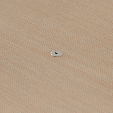 Close view of the Ello Micro Direct USB-C single port embeded in a Headway table surface.