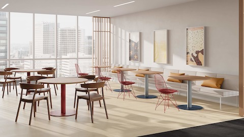 Headway Cafe Tables in a variety of colors and different top shapes in a cafe setting.