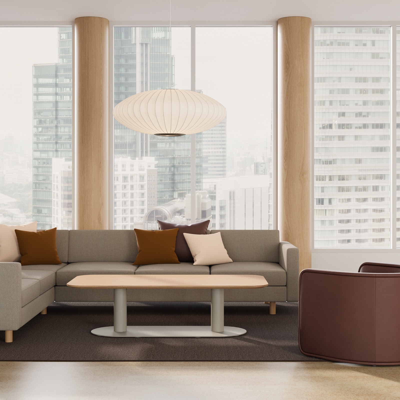 A seated-height Headway Cafe Table in a lounge setting.