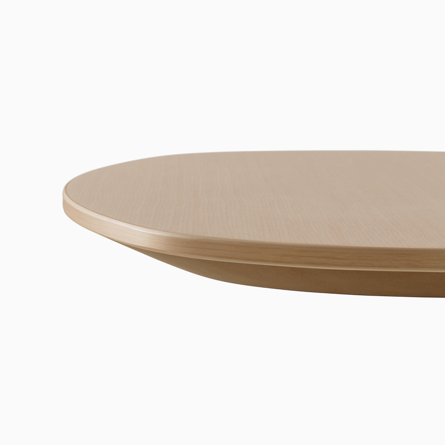 Close view of the thin edge on a Headway table with a Clear on Ash finish.