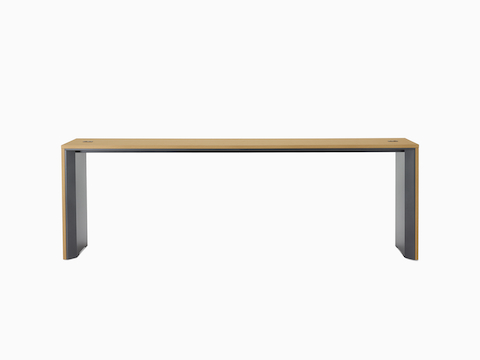 A narrow, standing-height Headway Communal Table with a light wood top and dark gray base viewed from the front.