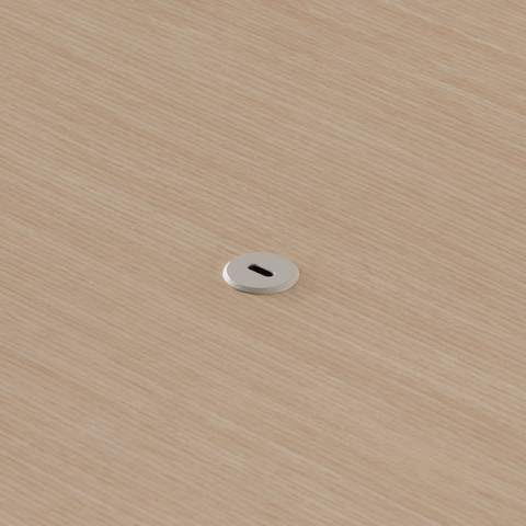 Close view of the Ello Micro Direct USB-C single port embedded in a Headway table surface.