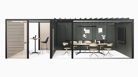 Two side-by-side Overlay spaces with a Headway conference table with Y base in one and an Eames standing tables in the other.