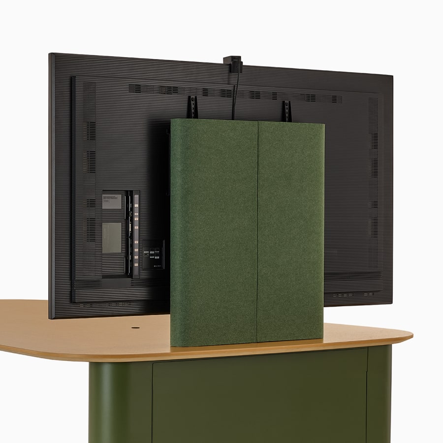 A Headway Huddle Table with mounted monitor and surface-embedded Ello Micro Vine USB-C power, viewed from the back.