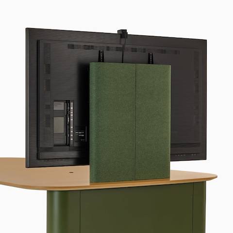 A Headway Huddle Table with mounted monitor and surface-embedded Ello Micro Vine USB-C power, viewed from the back.