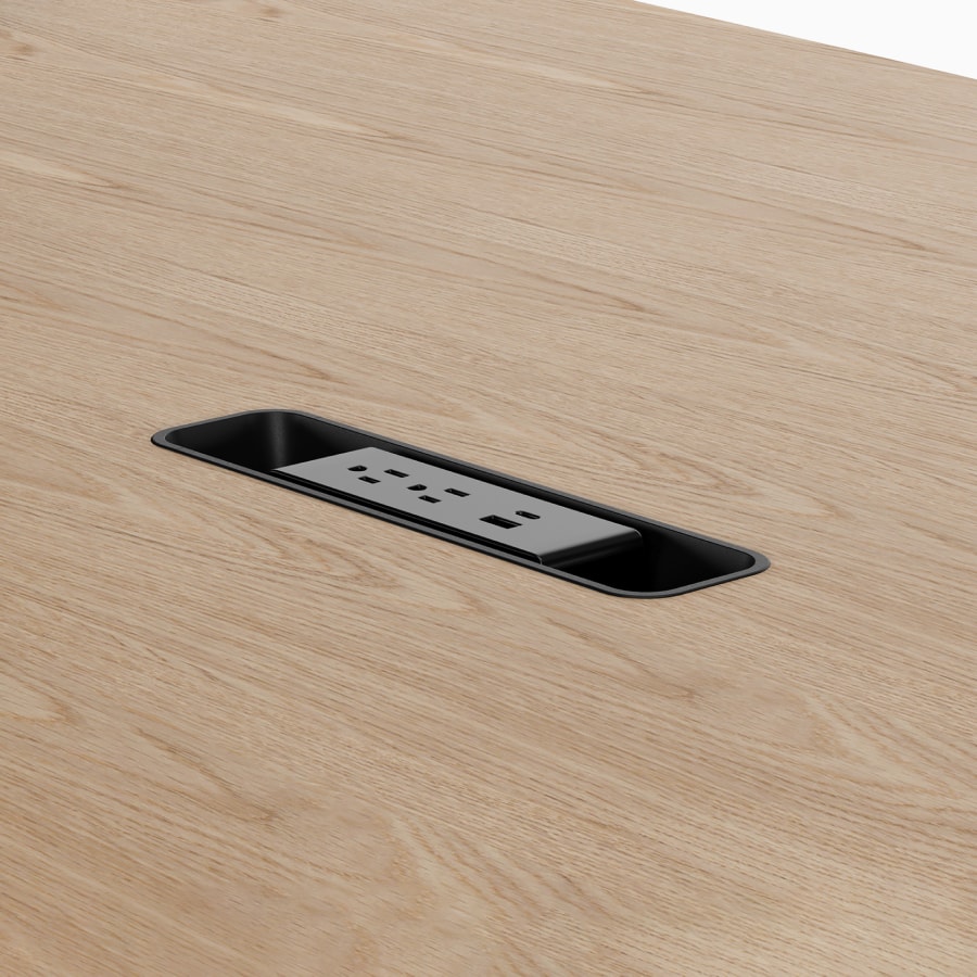 A Headway table with Cove Collection drop-in power.