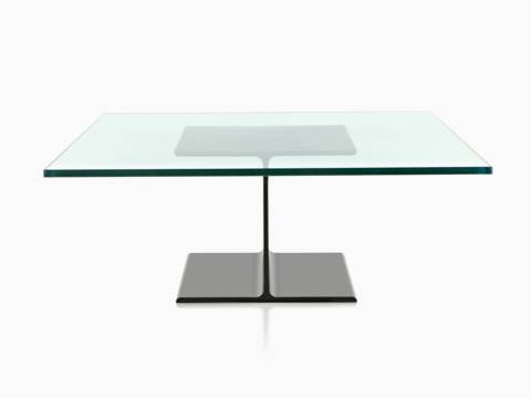 A cast aluminum I Beam occasional table with a glass top. 