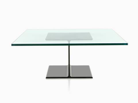 A cast aluminum I Beam occasional table with a glass top. A cast aluminum I Beam occasional table with a glass top.