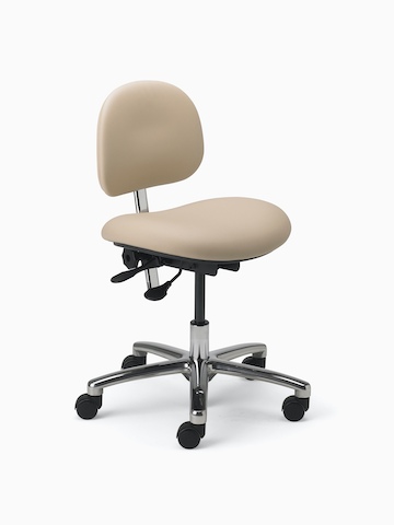 Lab Stool in a beige upholstered seat and back and a chrome base with dual lever adjustment and a 5-star base with casters.
