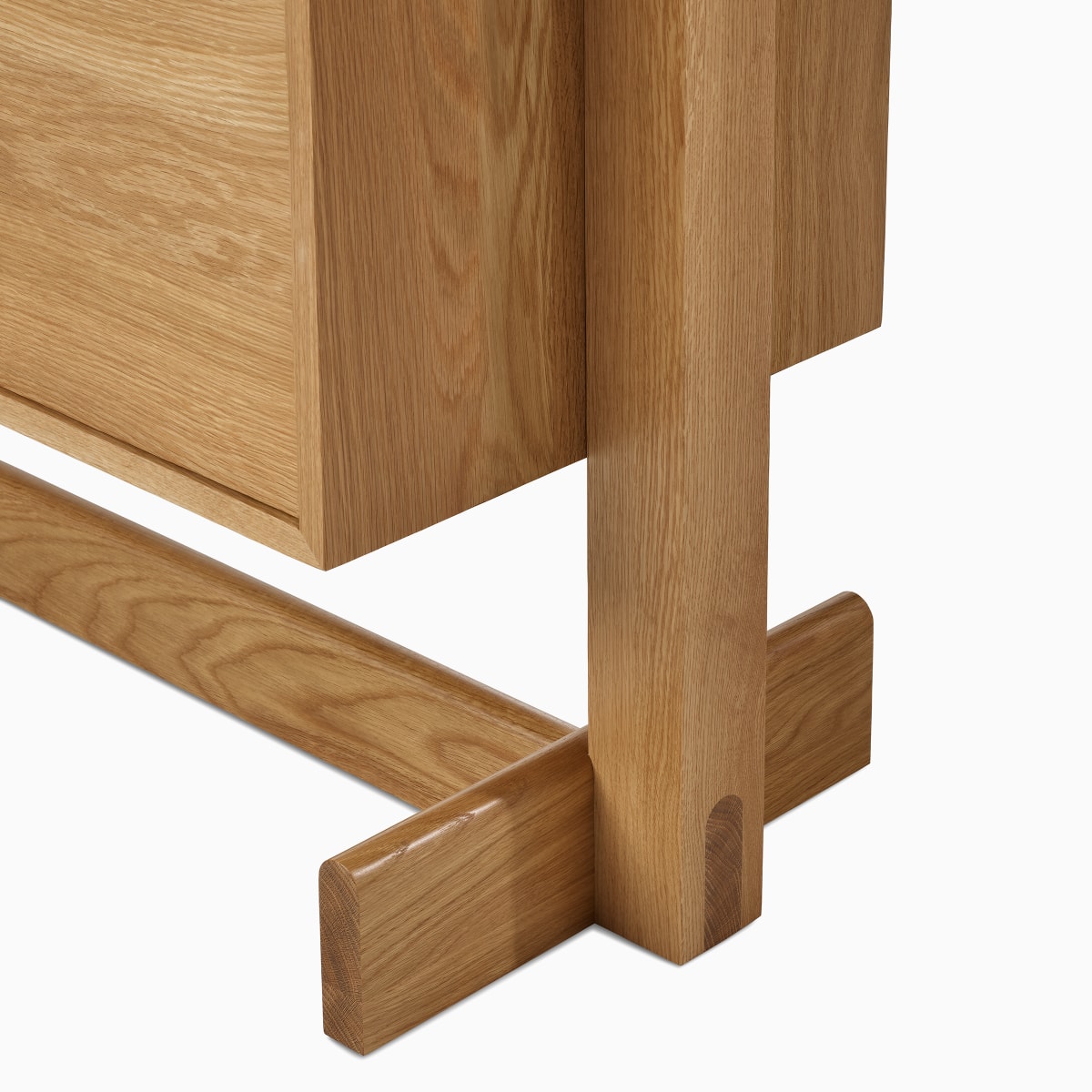 A detail view of the Land Storage leg in oak.