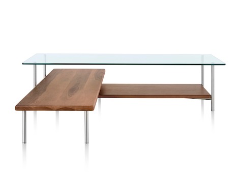 An L-shaped Layer glass top coffee table with two wood lower shelves.