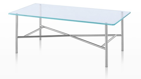 Une table d'appoint rectangulaire Layer avec un dessus en verre et un contreventement distinctif ci-dessous.