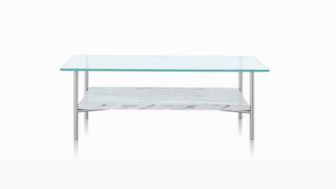 Table occasionnelle Layer rectangulaire avec plateau supérieur en verre et plateau inférieur en pierre. Table occasionnelle Layer rectangulaire avec plateau supérieur en verre et plateau inférieur en pierre.