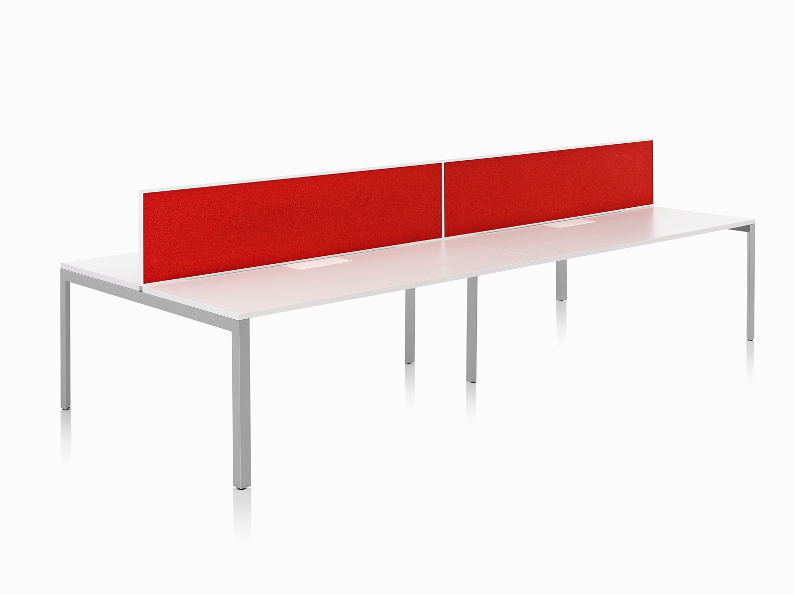 A Layout Studio bench for four with a white laminate top, gray legs, and red framed fabric center privacy screens.