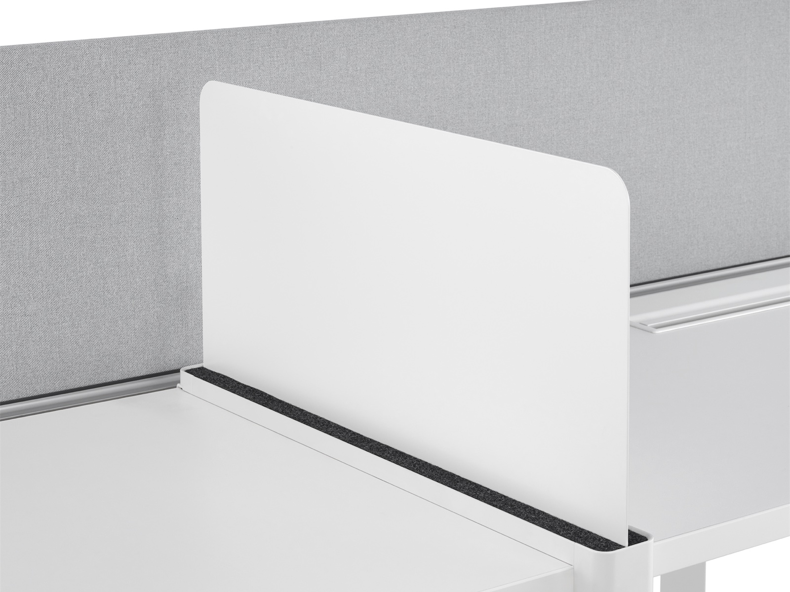 Close-up of a white Ubi Slim Screen, installed on a Layout Studio work surface.