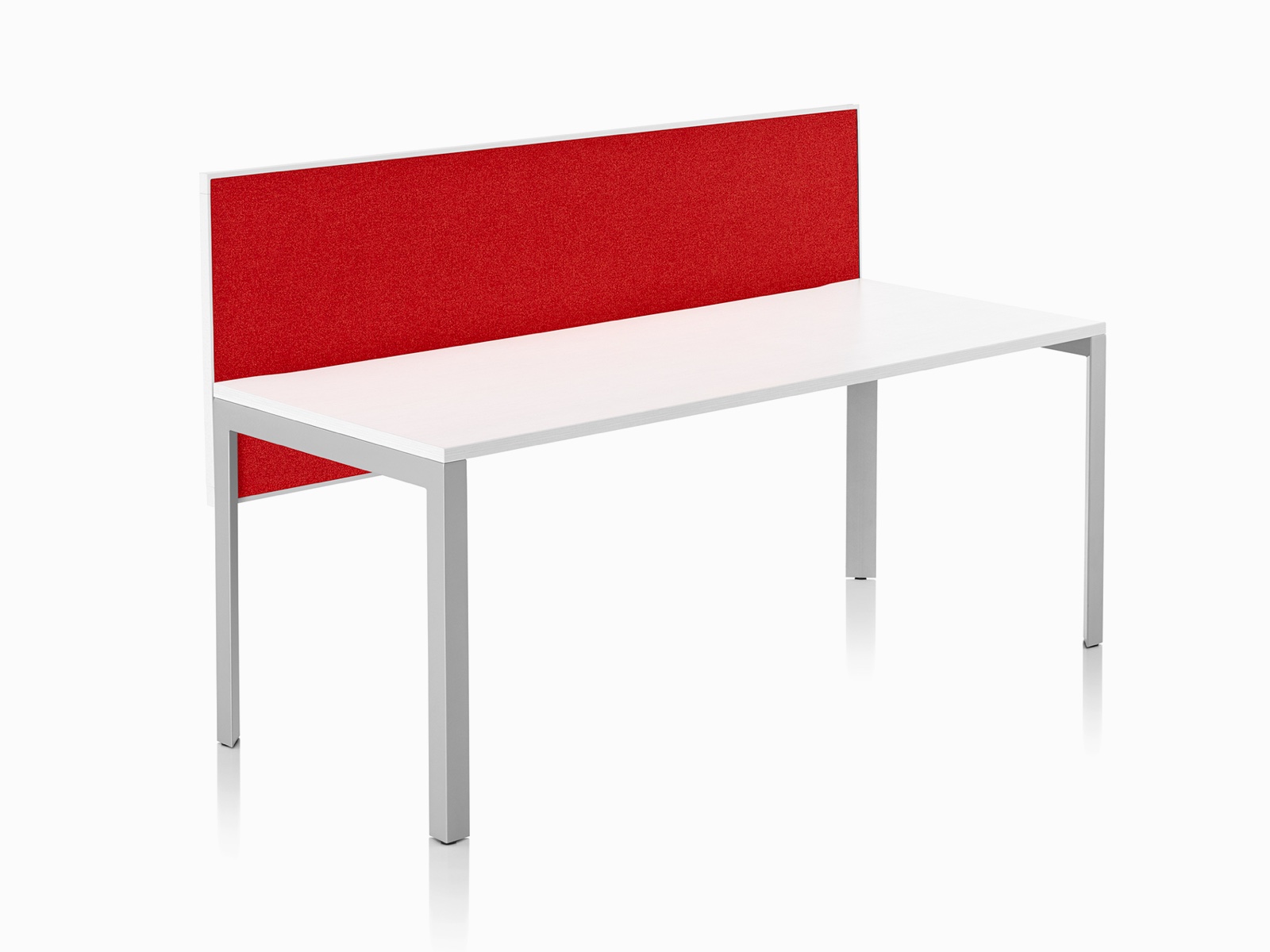 Viewed at an angle, the front side of a red fabric, framed edge, Pari surface-attached privacy screen on a white, single-sided Layout Studio bench.