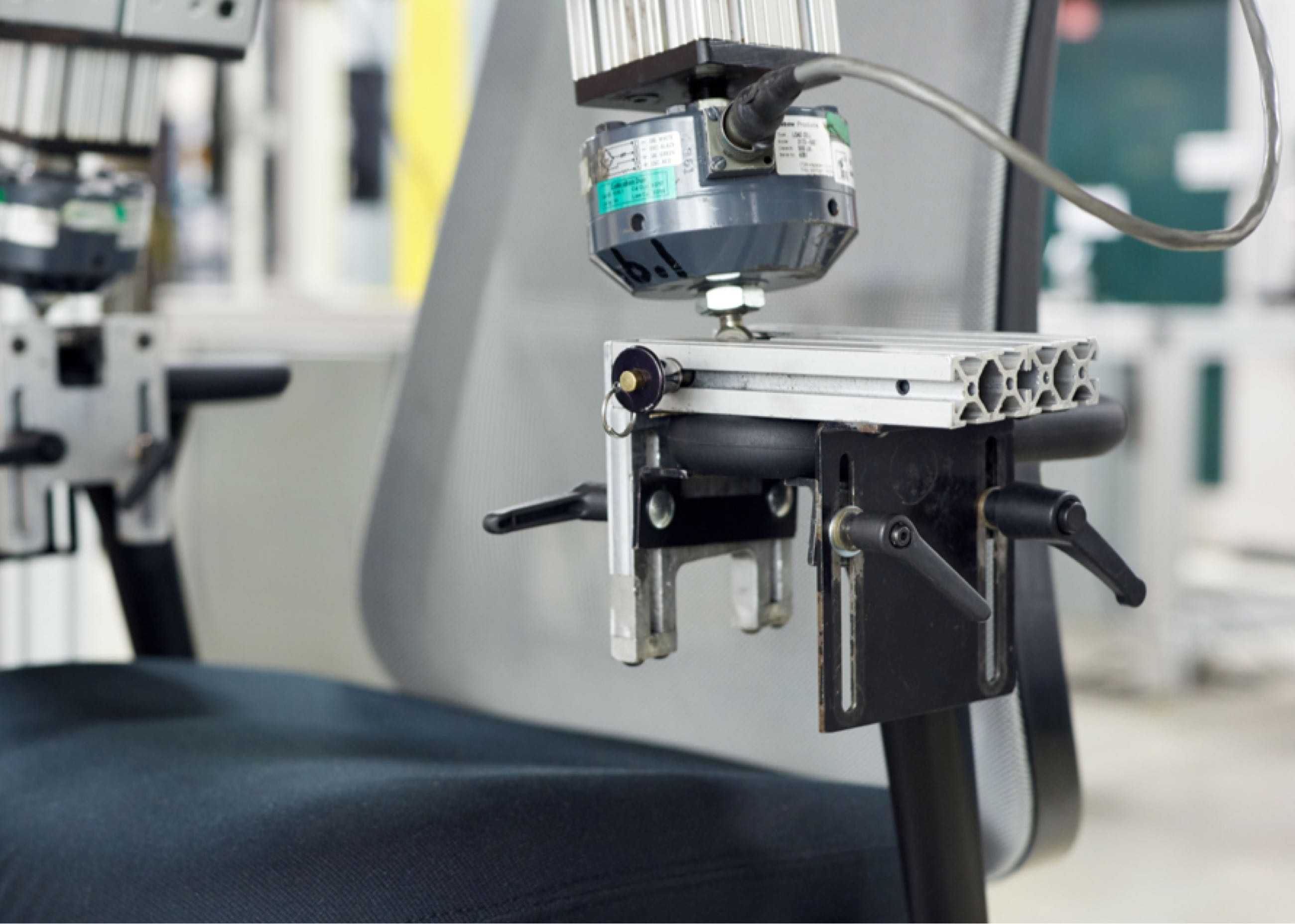 Black Lino Chair being tested in the Herman Miller Test Lab. 