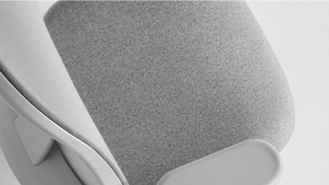 Close up image of a Gray Lino Chair, viewed from the top at an angle. Close up image of a Gray Lino Chair, viewed from the top at an angle.