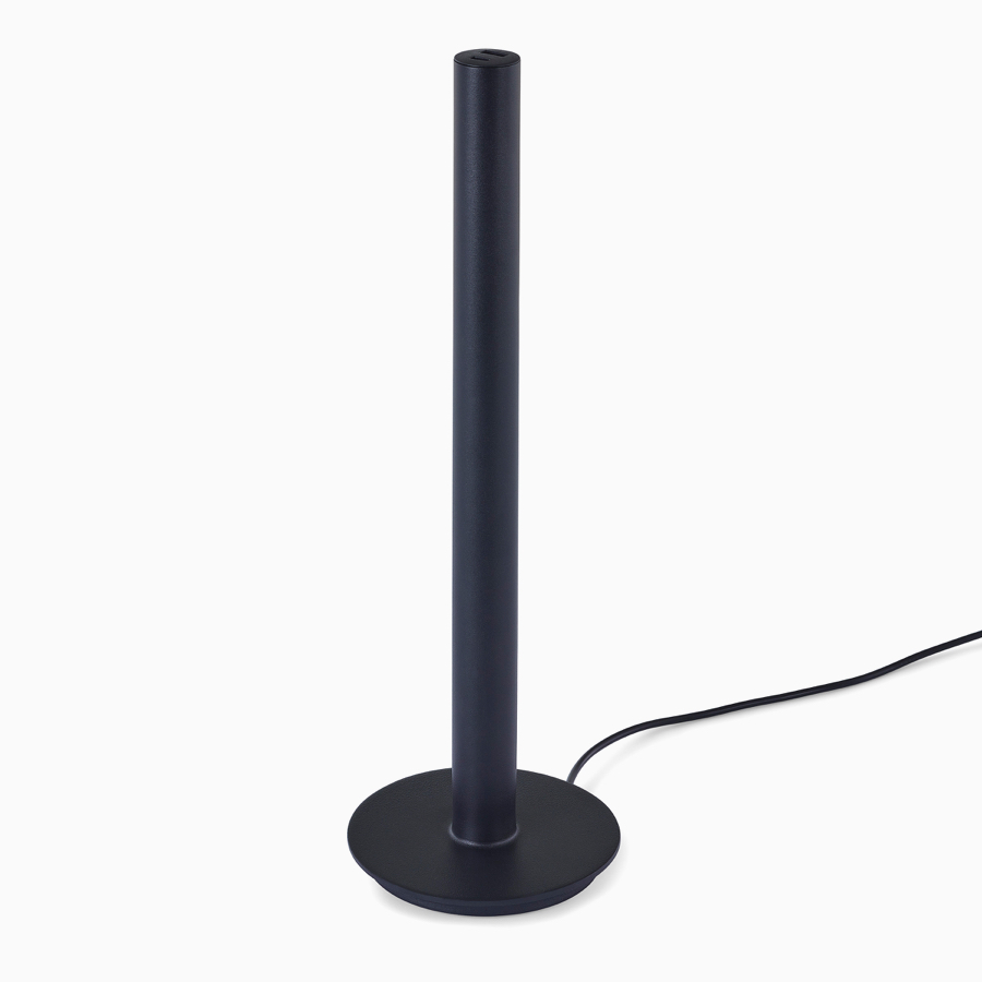 A black Logic Micro Tower with a power cord.