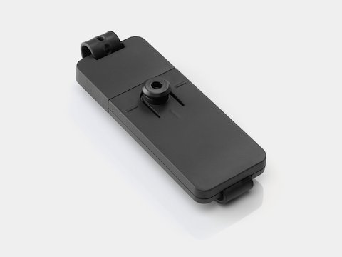 The top side of a compact Loop Micro Mount which would effortlessly attach to a bracket under a desk.