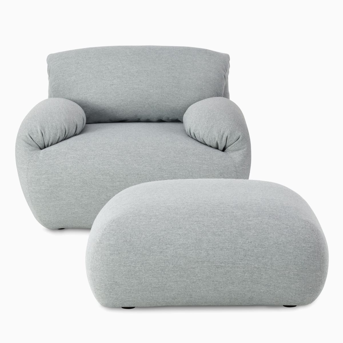 Luva 模块化沙发扶手椅和脚凳。