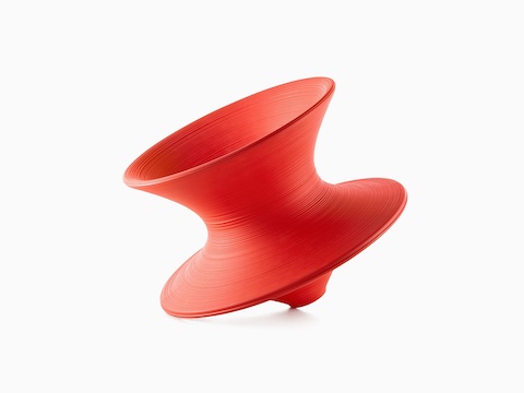 Red Magis Spun Chair, viewed from the side.