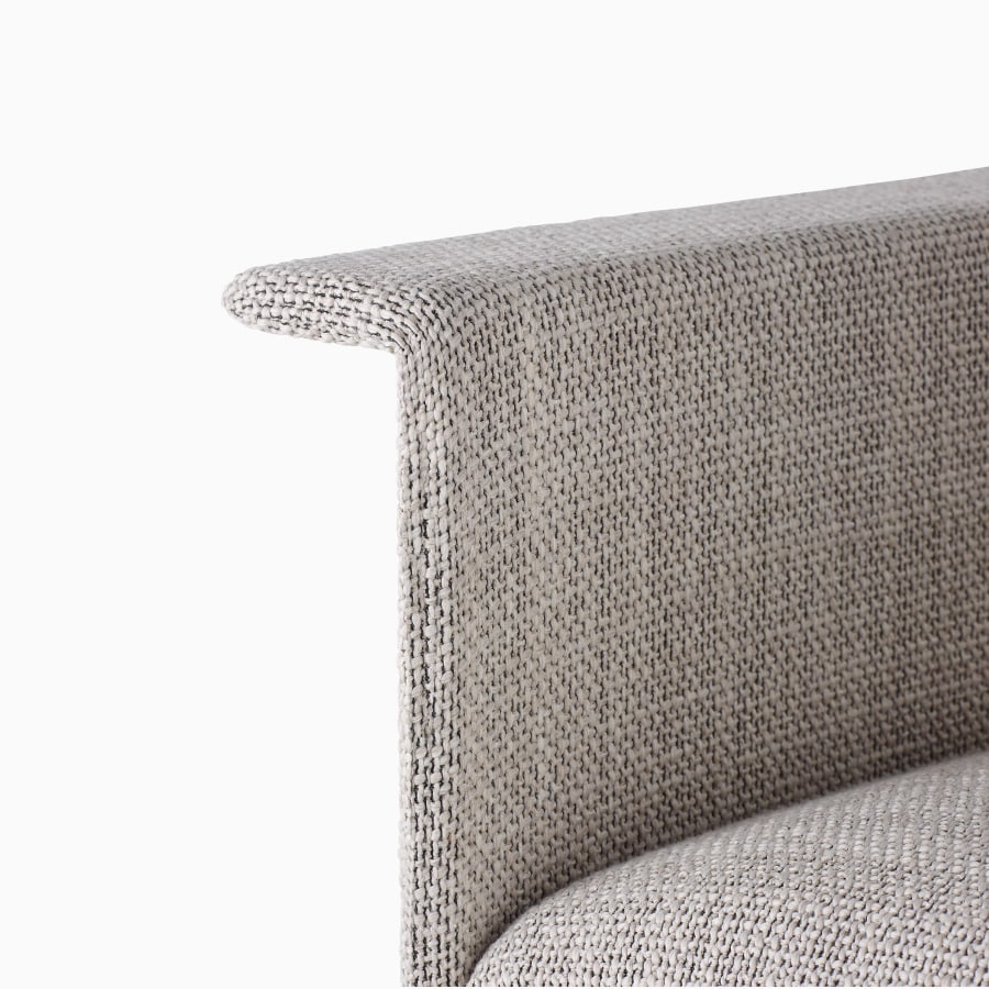 A detailed view of a Mantle Club Chair upholstered in Capri Stone.