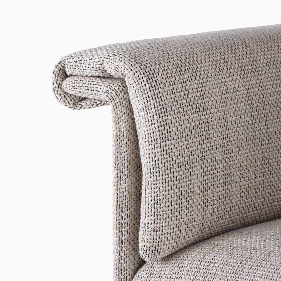 A detailed view of an attachable cushion on the arm of a Mantle Sofa upholstered in Capri Stone.