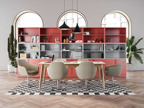 Componentes Meridian Storage vermelhos e cinza atrás de uma mesa de reuniões Dalby branca e marrom com seis cadeiras Saiba marrom-claras.