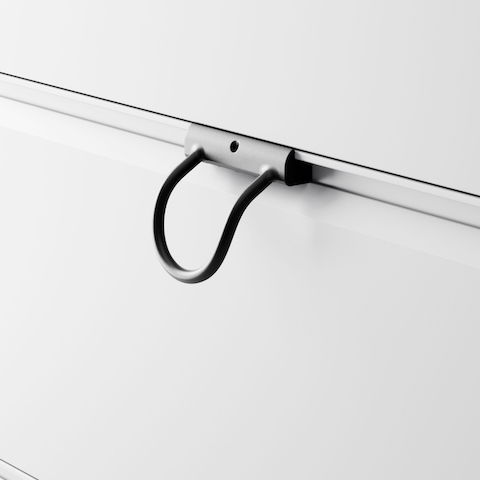 Close up of a light gray Meridian Storage lateral file with an enhanced access pull, viewed from an angle.