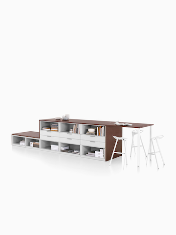 Dark brown and white Meridian Storage lateral file and bookshelf configuration with collaborative surface and three white Magis Stool One stools.