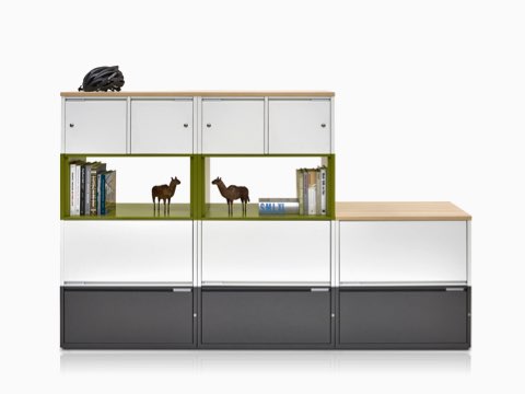 Stackable Meridian Storage units in black, white, and green make efficient use of verticle storage space.