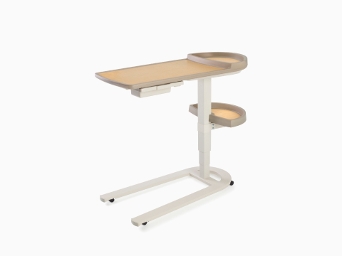 Mirage Overbed Table on white sweep, viewed at an angle. Mirage Overbed Table on white sweep, viewed at an angle.