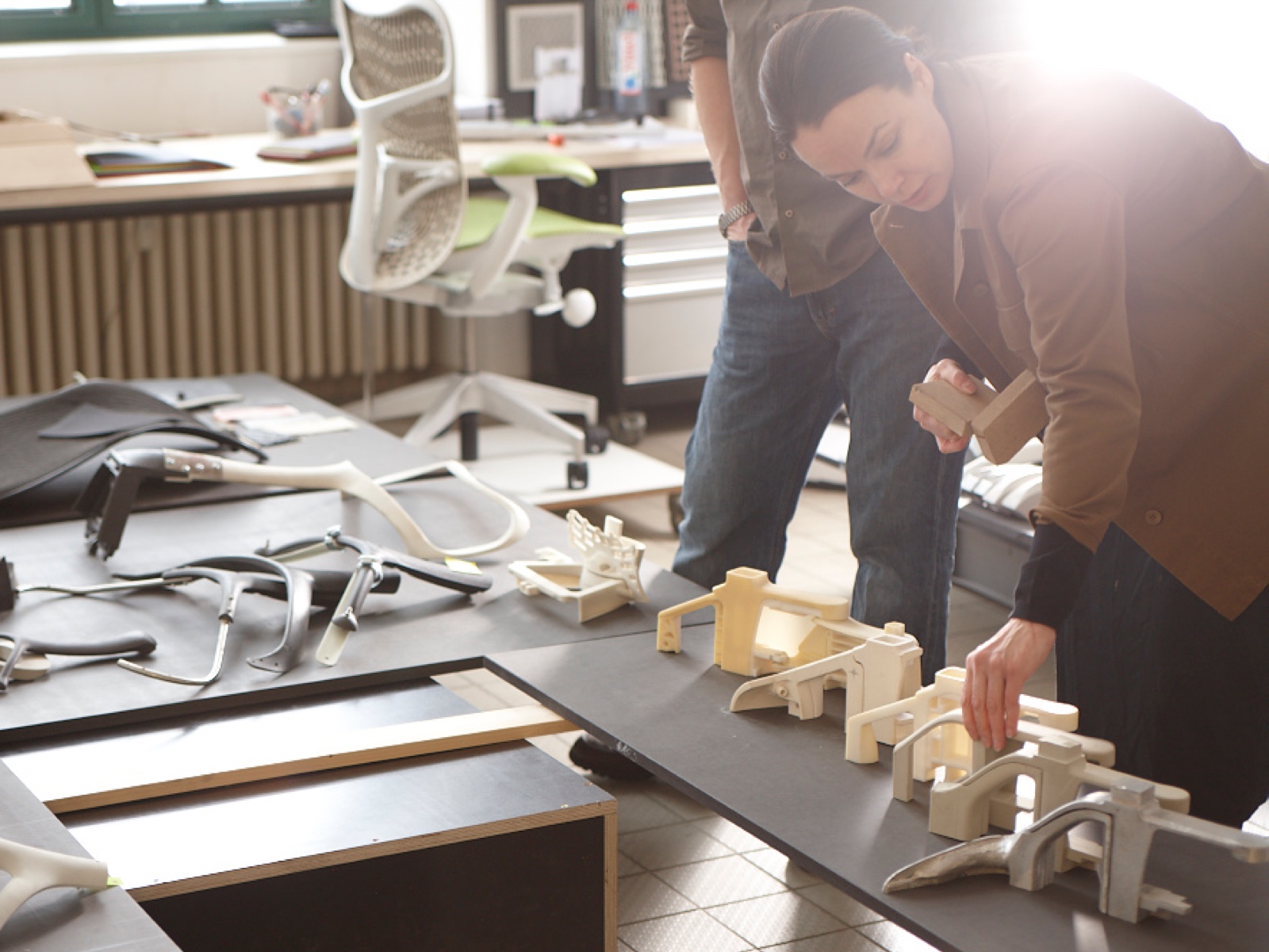 Designer Carola Zwick of Studio 7.5 examines components of the Mirra 2 office chair. Designer Carola Zwick of Studio 7.5 examines components of the Mirra 2 office chair.