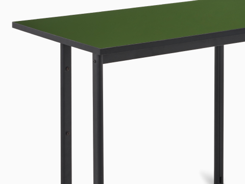 Angle view of Mode desk in black with pesto top.