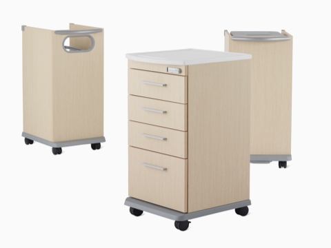 Three Mora casework carts, including a supply cart, linen cart, and trash cart in a light ash finish. Three Mora casework carts, including a supply cart, linen cart, and trash cart in a light ash finish.