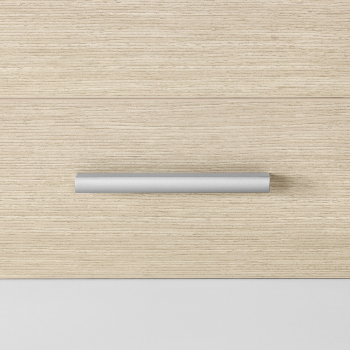 A close-up view of a Mora Casework storage drawer in an ash wood finish with a bar pull in a light gray finish.