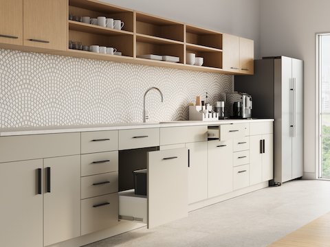 Mora Casework upper and lower cabinets in a break room setting, trash/recycle cabinet halfway open.