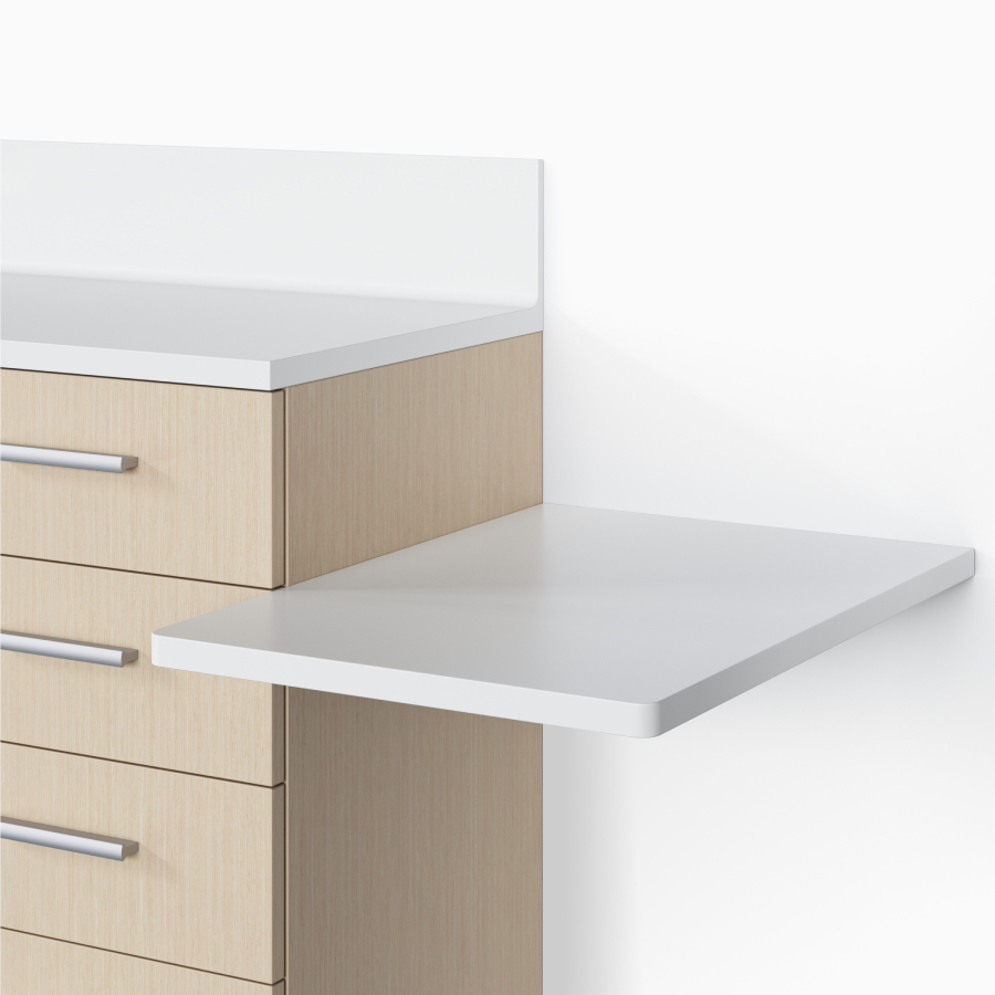 A close-up view of a Mora Casework in an ash wood finish with a seated-height side surface in white.