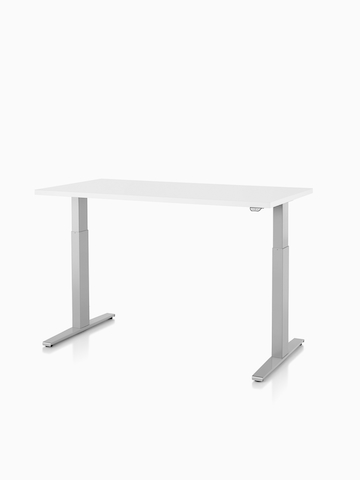 A Motia Sit-to-Stand Table with a white top.