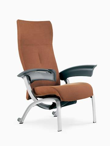 A rust-coloured Nala Patient Chair, viewed from a 45-degree angle.