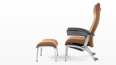 Profile view of a copper-coloured Nala Patient Chair and ottoman. Profile view of a copper-coloured Nala Patient Chair and ottoman.