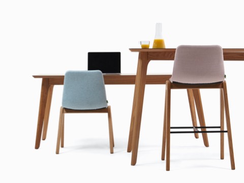 Two Dalby Conference Tables, one with a Viv Wood Chair and one in bar-height with a Viv Wood Stool. Two Dalby Conference Tables, one with a Viv Wood Chair and one in bar-height with a Viv Wood Stool.