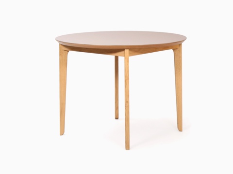 A round NaughtOne Dalby Café Table, viewed at an angle. A round NaughtOne Dalby Café Table, viewed at an angle.