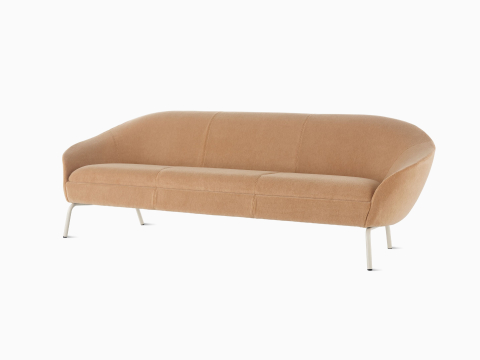 A front angled view of neutral brown upholstered Ever three-seat sofa with oyster steel legs.
